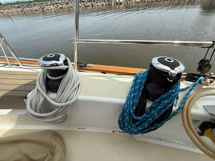 Chapter 9 Yacht Photos Pics Sailboat deck with winches and ropes, Tartan 4000, 2012 model, near calm water.