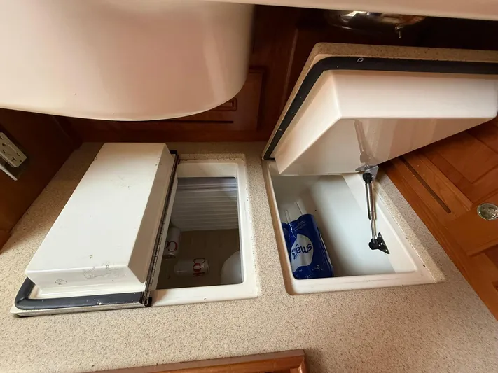 Chapter 9 Yacht Photos Pics Built-in storage compartments in a 2012 Tartan 4000 yacht kitchen.