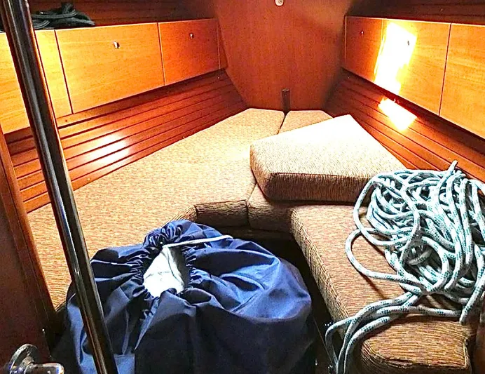 Princessa Yacht Photos Pics Interior cabin of 2000 Beneteau 44 Center Cockpit with cushions and rope.