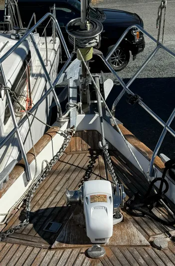 Princessa Yacht Photos Pics 2000 Beneteau 44 Center Cockpit sailboat deck with anchor and winch system.