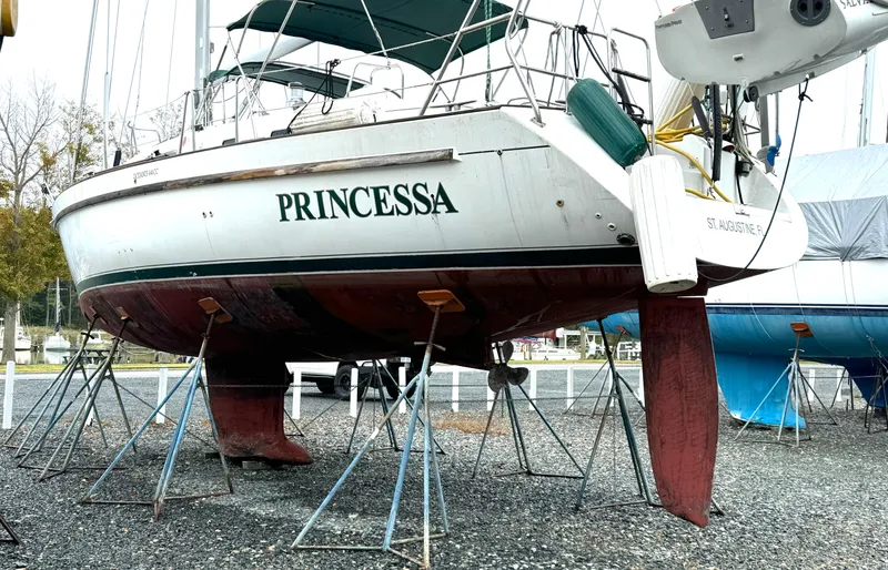 Princessa Yacht Photos Pics Beneteau 44 Center Cockpit sailboat "Princessa" on stands, year 2000, in a boatyard.