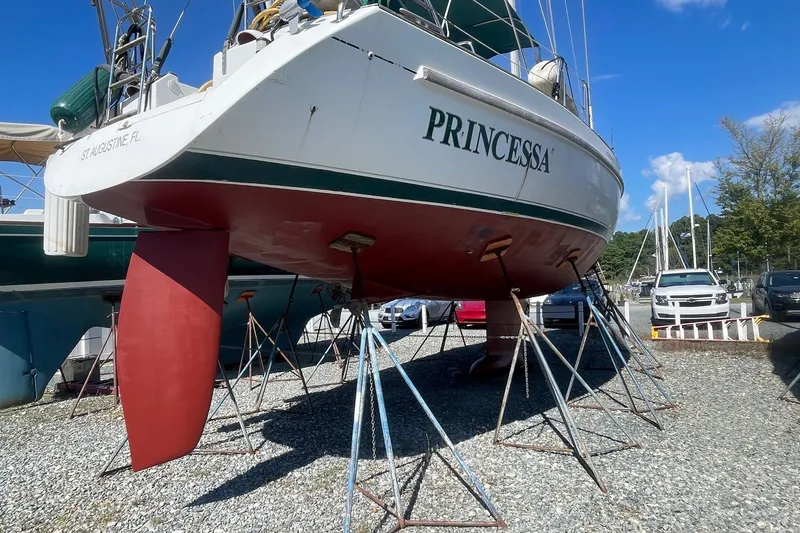 Princessa Yacht Photos Pics Beneteau 44 Center Cockpit sailboat, 2000 model, named "PRINCESSA" on dry dock.