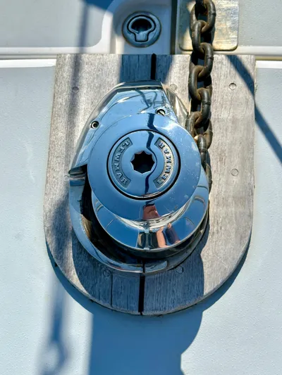 Après Yacht Photos Pics Chrome winch on 2010 Beneteau 57 yacht deck with chain.