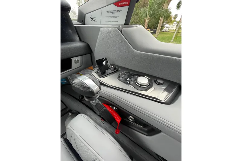 Motivated Yacht Photos Pics 2025 Nautique Super Air Nautique G23 Paragon cockpit controls, featuring sleek design and advanced technology.