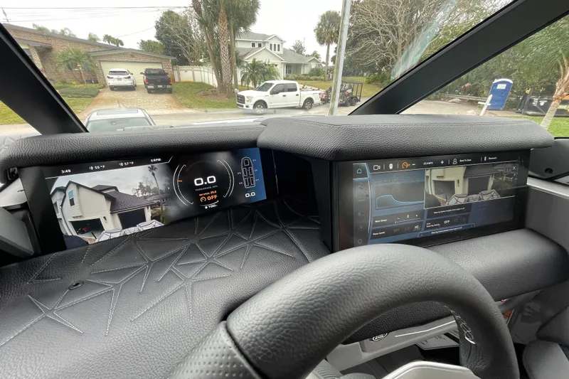 Motivated Yacht Photos Pics 2025 Nautique Super Air Nautique G23 Paragon dashboard with advanced digital displays.