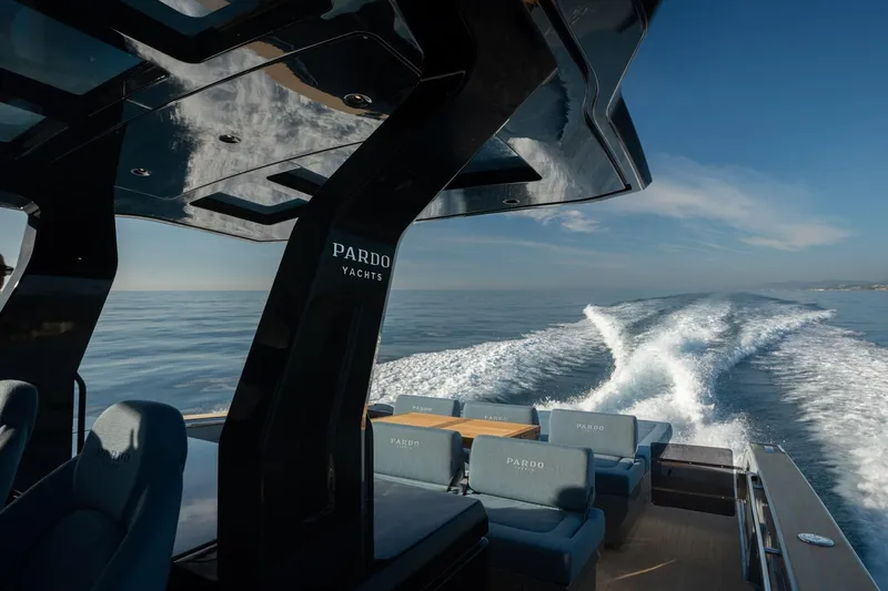  Yacht Photos Pics 2026 Pardo Yachts 43 cruising on open water, showcasing luxury seating and sleek design.