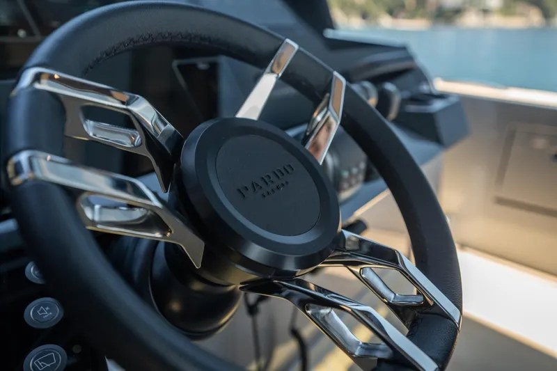 Yacht Photos Pics Steering wheel of 2026 Pardo Yachts 43, showcasing sleek design and craftsmanship.