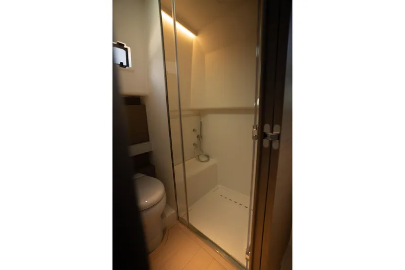  Yacht Photos Pics Bathroom interior of 2026 Pardo Yachts 43, featuring modern shower and toilet.