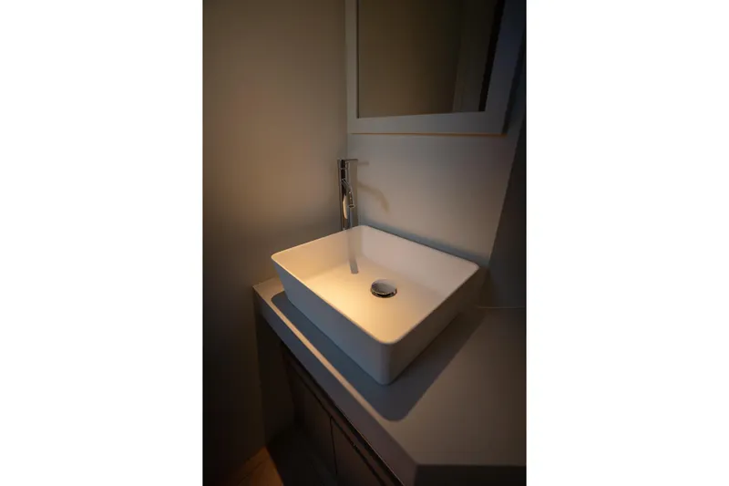  Yacht Photos Pics Modern bathroom sink on Pardo Yachts 43, 2026 model, with sleek design and ambient lighting.