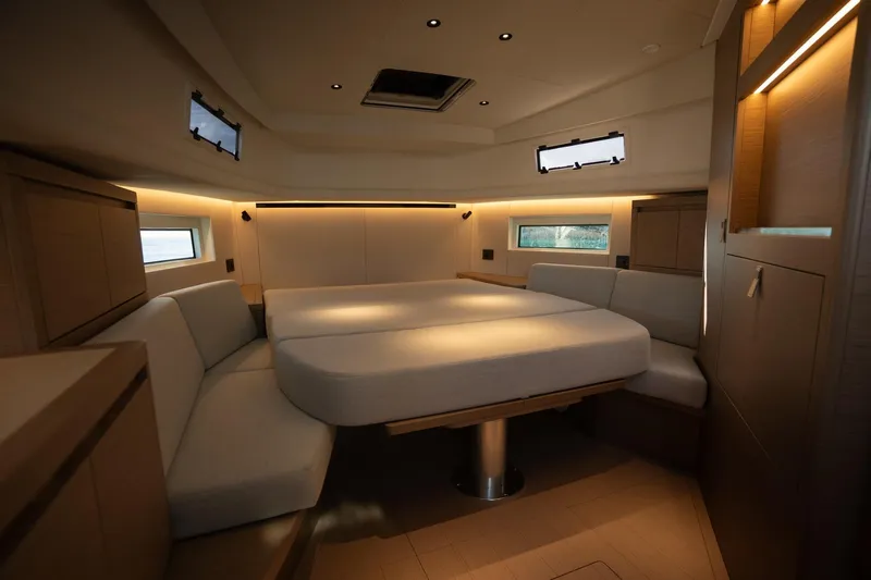  Yacht Photos Pics Luxurious interior of 2026 Pardo Yachts 43, featuring elegant seating and ambient lighting.