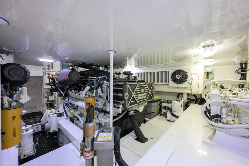  Yacht Photos Pics Engine room of 2015 Viking 62 Convertible yacht, featuring CAT marine engines.