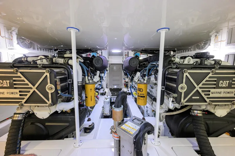  Yacht Photos Pics Engine room of 2015 Viking 62 Convertible yacht with CAT marine power engines.