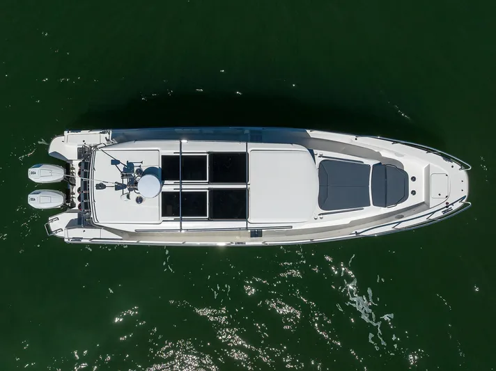 Sea Nn Me III Yacht Photos Pics Aerial view of 2024 Nimbus C11 boat on green water.