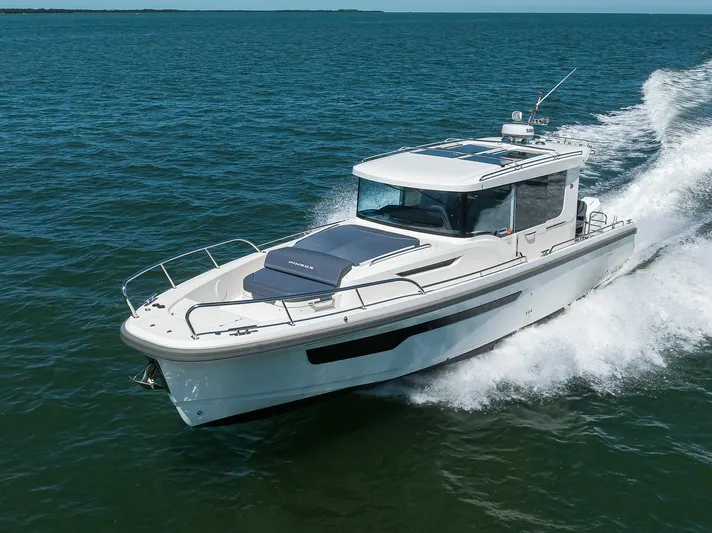 Sea Nn Me III Yacht Photos Pics 2024 Nimbus C11 boat cruising on open water, showcasing sleek design and performance.