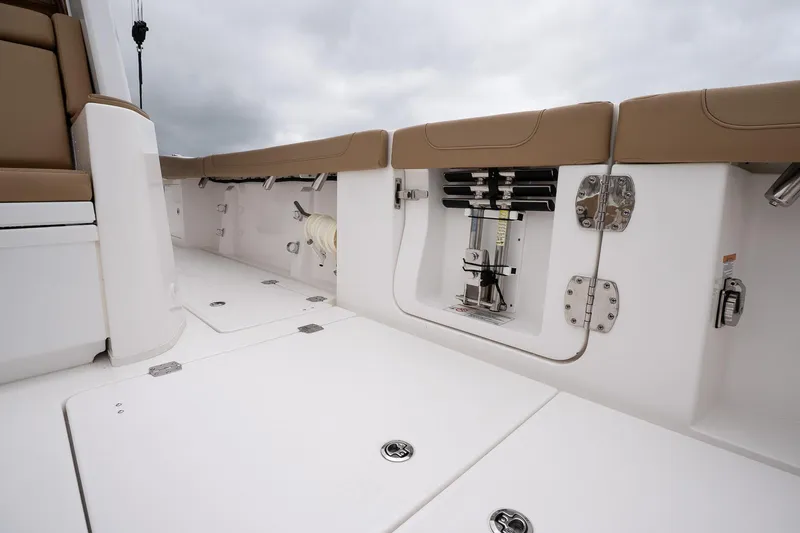  Yacht Photos Pics 2025 Caymas 44 CT boat interior with white deck and tan seating.