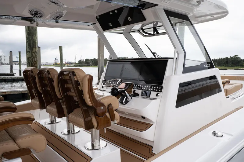  Yacht Photos Pics 2025 Caymas 44 CT boat interior with modern helm and luxurious seating.