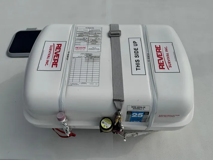 Reel Outlaw Yacht Photos Pics Revere Survival Inc. life raft on 1998 Richards Yachts Custom Flybridge Sportfish.