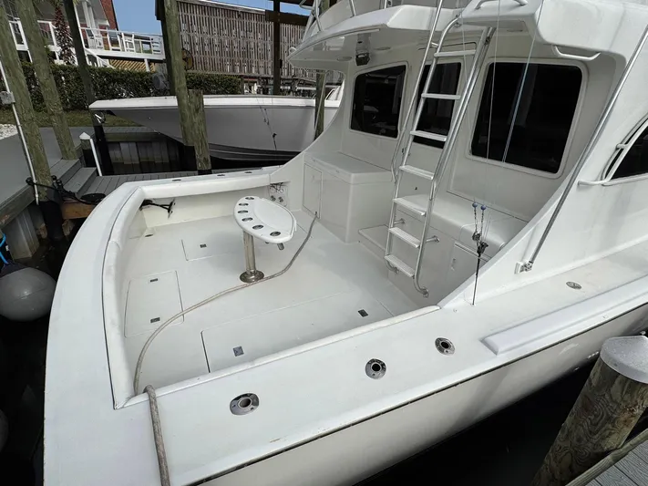 Reel Outlaw Yacht Photos Pics 1998 Richards Yachts Custom Flybridge Sportfish with spacious deck and fishing chair.