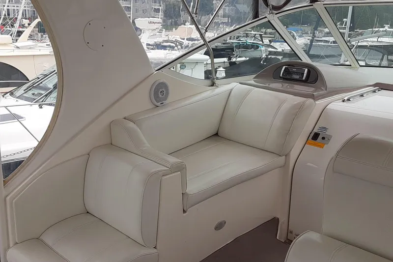 Cato Yacht Photos Pics Interior of 2003 Cruisers Yachts 4050 Express with white leather seating.