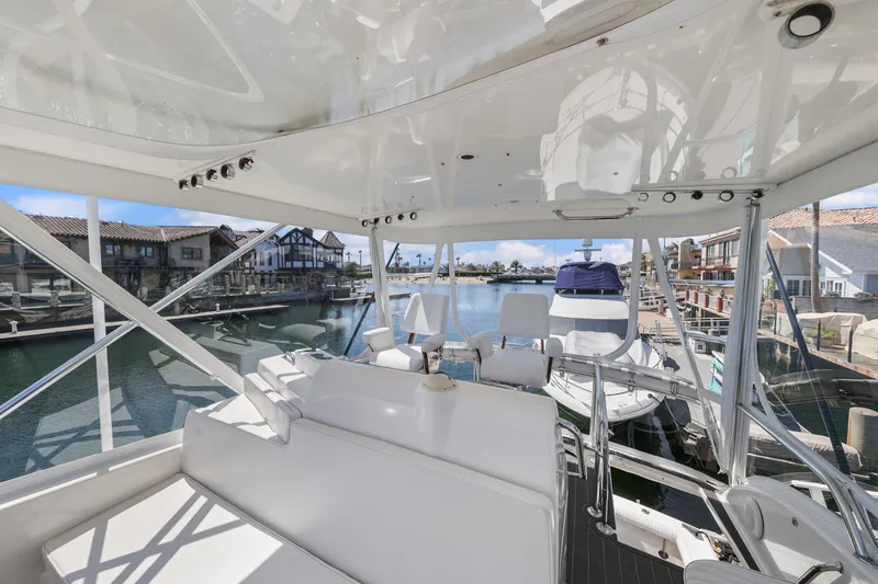 Legacy Yacht Photos Pics 2004 Cabo 40 Flybridge Convertible yacht interior with marina view.