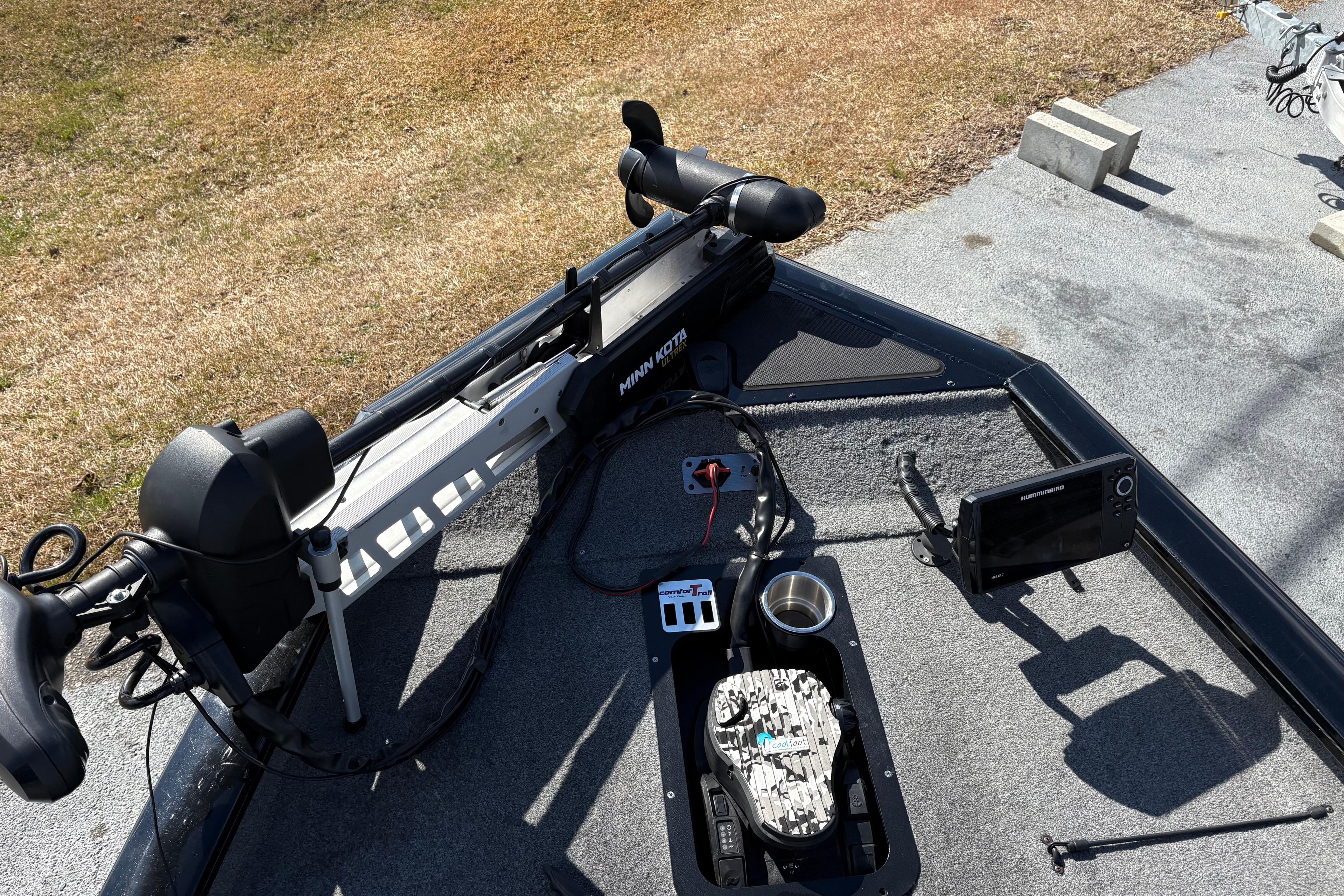 2017 Tracker Pro Team 175 TXW boat deck with Minn Kota trolling motor and Humminbird fish finder.