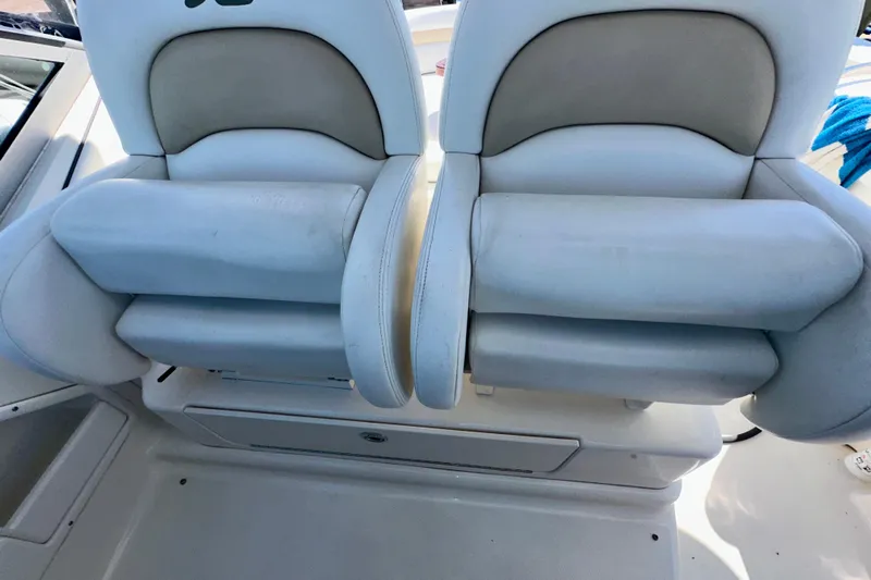 Lonie Marie Yacht Photos Pics 2008 Sea Ray 340 Sundancer boat seats, white leather upholstery, dual seating arrangement.