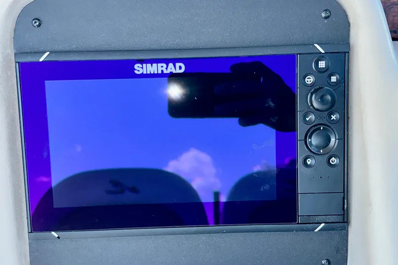 Lonie Marie Yacht Photos Pics Simrad display on 2008 Sea Ray 340 Sundancer boat dashboard.