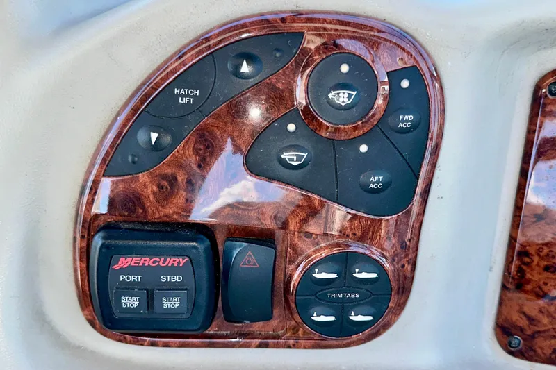 Lonie Marie Yacht Photos Pics Control panel of a 2008 Sea Ray 340 Sundancer boat with various switches.