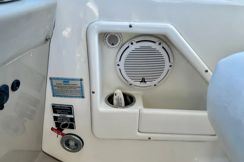 Lonie Marie Yacht Photos Pics 2008 Sea Ray 340 Sundancer interior with speaker and yacht certification plaque.