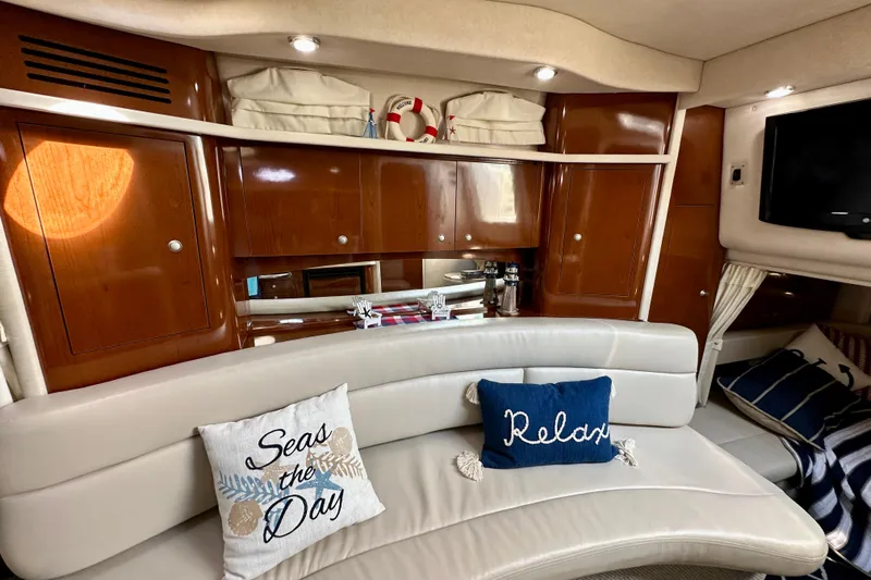 Lonie Marie Yacht Photos Pics Luxurious interior of 2008 Sea Ray 340 Sundancer with cozy seating and nautical decor.