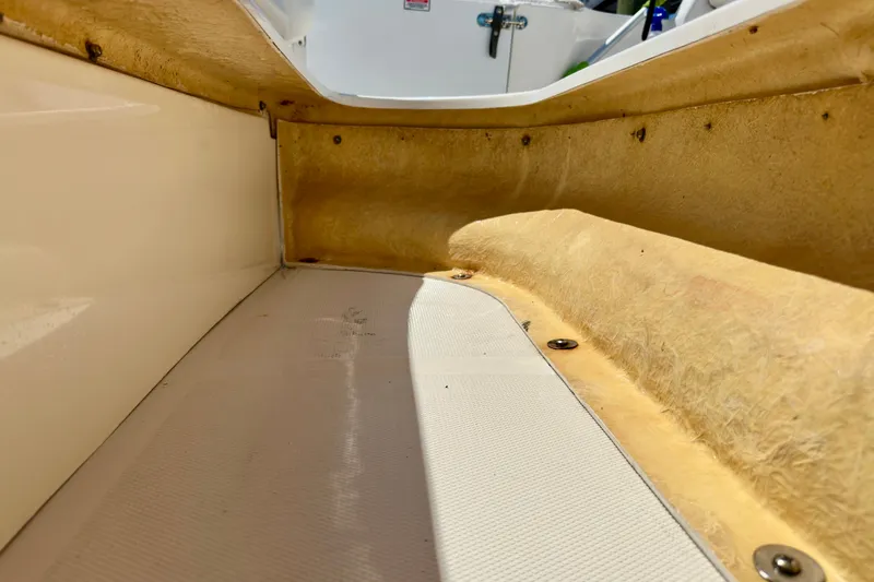 Lonie Marie Yacht Photos Pics Interior view of a 2008 Sea Ray 340 Sundancer boat, showcasing seating and fiberglass details.