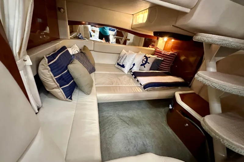 Lonie Marie Yacht Photos Pics Luxurious interior of 2008 Sea Ray 340 Sundancer with plush seating and nautical decor.