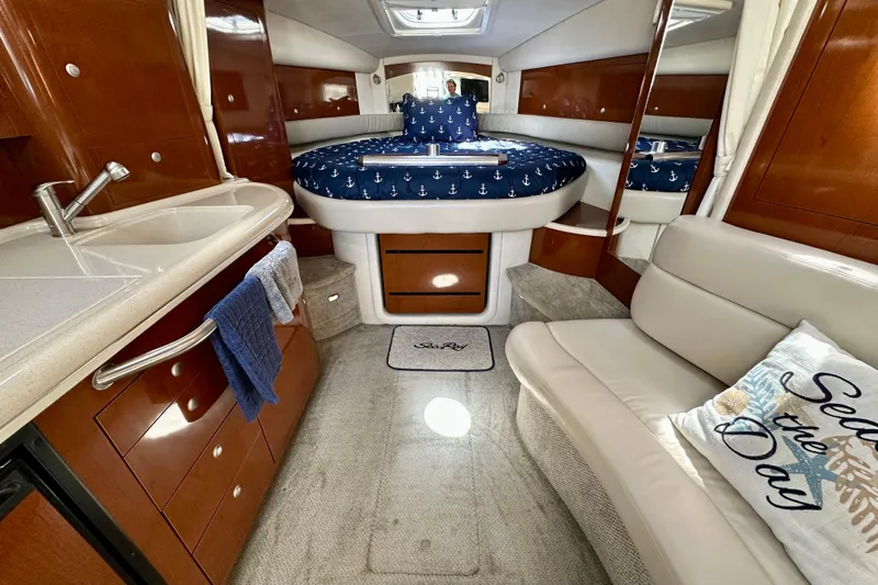 Lonie Marie Yacht Photos Pics Luxurious 2008 Sea Ray 340 Sundancer cabin interior with cozy seating and nautical decor.