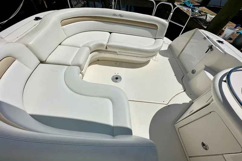 Lonie Marie Yacht Photos Pics 2008 Sea Ray 340 Sundancer boat interior with white seating and storage compartments.