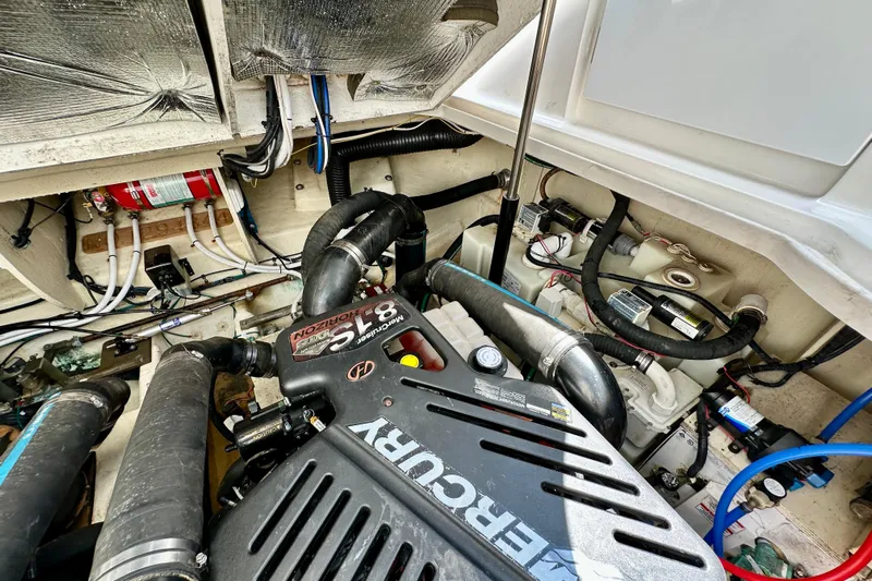Lonie Marie Yacht Photos Pics Engine compartment of 2008 Sea Ray 340 Sundancer with Mercury 8.1S Horizon engine.