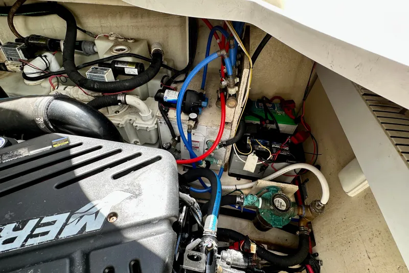 Lonie Marie Yacht Photos Pics Engine compartment of a 2008 Sea Ray 340 Sundancer with visible wiring and components.