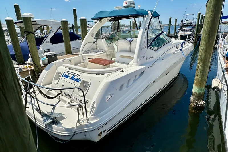 Lonie Marie Yacht Photos Pics 2008 Sea Ray 340 Sundancer docked at marina, clear sky, calm water.