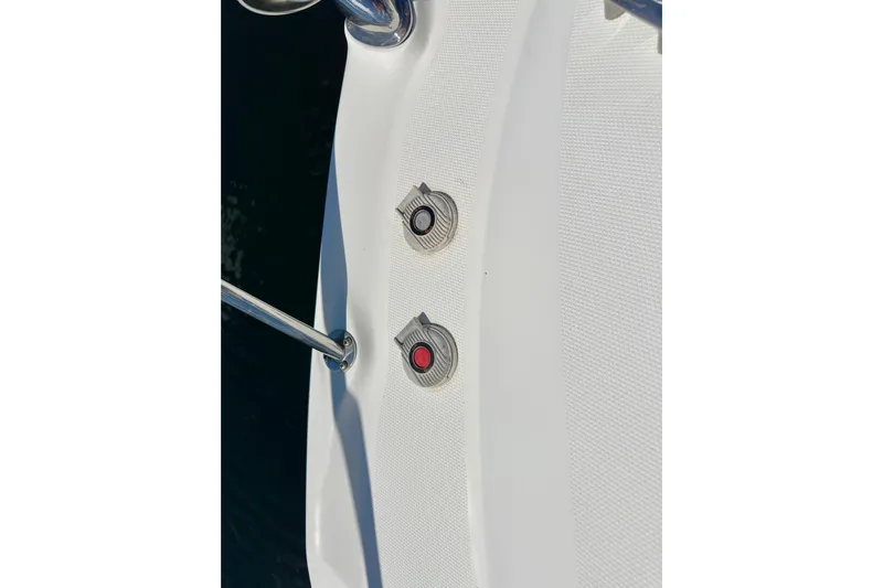 Lonie Marie Yacht Photos Pics Close-up of 2008 Sea Ray 340 Sundancer boat deck with two circular fittings.