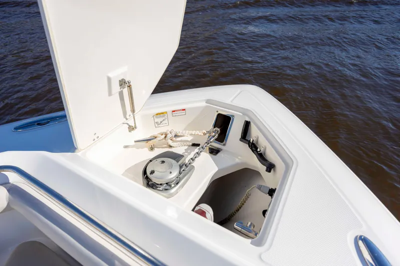  Yacht Photos Pics 2019 Boston Whaler 350 Outrage anchor compartment with rope and chain on water.