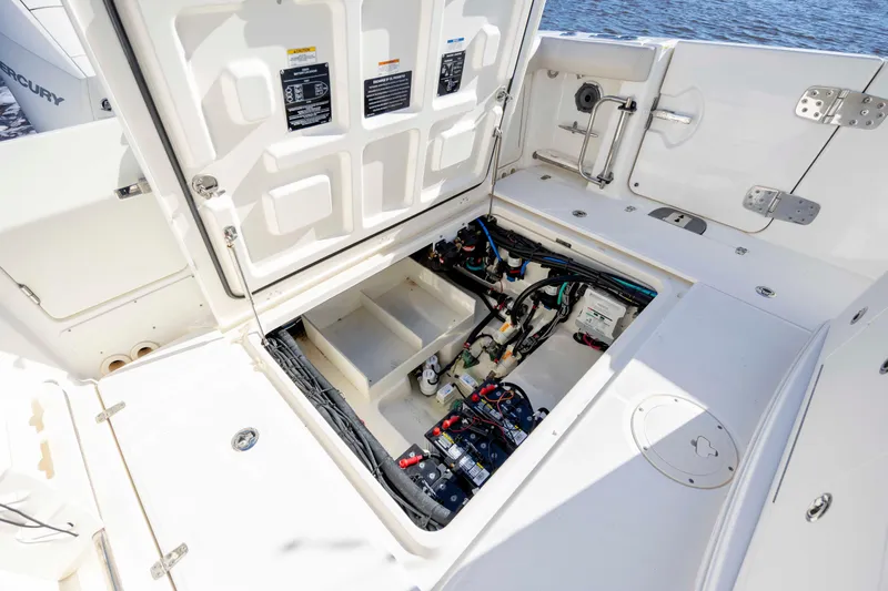  Yacht Photos Pics 2019 Boston Whaler 350 Outrage engine compartment, showcasing wiring and mechanical components.