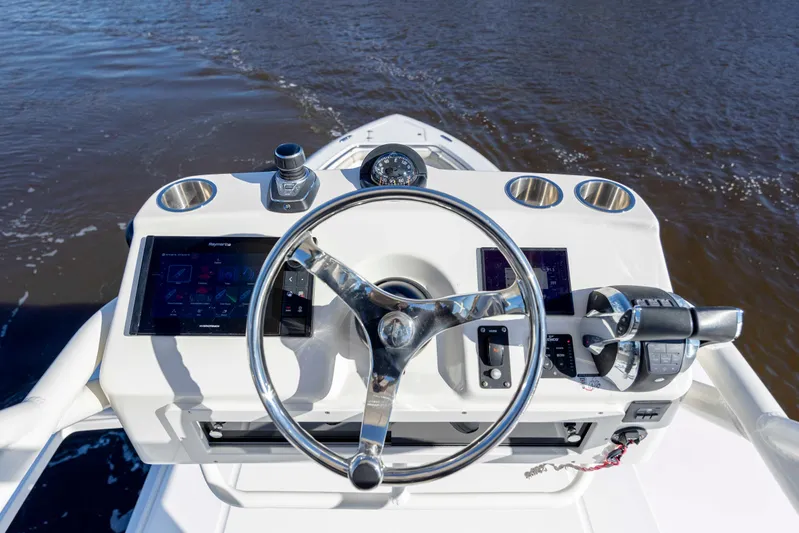  Yacht Photos Pics 2019 Boston Whaler 350 Outrage helm with modern controls and navigation screens.