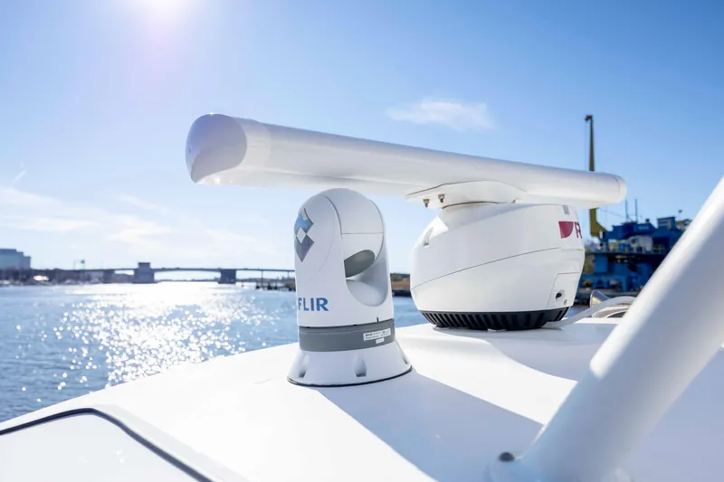  Yacht Photos Pics 2019 Boston Whaler 350 Outrage with advanced navigation equipment on a sunny day.