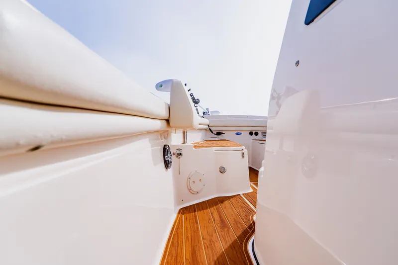  Yacht Photos Pics 2021 Grady-White Canyon 306 boat interior with sleek design and wooden flooring.