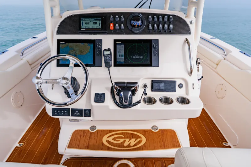  Yacht Photos Pics 2021 Grady-White Canyon 306 helm with advanced navigation and control systems.