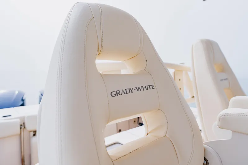  Yacht Photos Pics 2021 Grady-White Canyon 306 boat seats with logo, showcasing luxury and comfort.