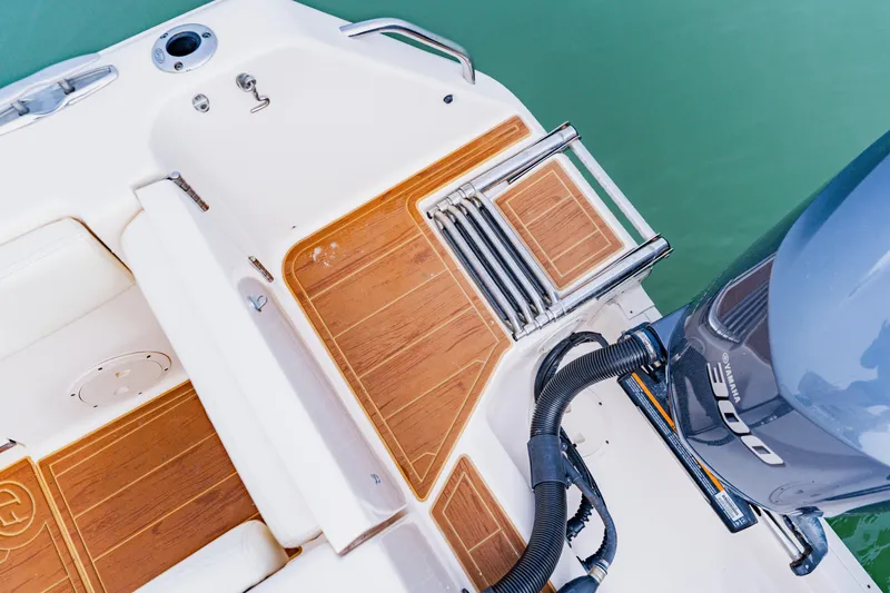  Yacht Photos Pics 2021 Grady-White Canyon 306 boat with teak deck and Yamaha outboard motor.