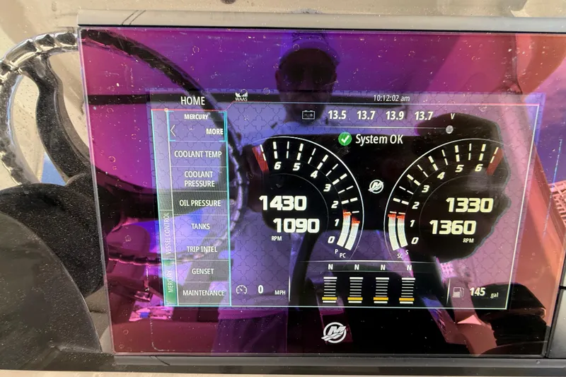  Yacht Photos Pics Dashboard display of a 2017 Boston Whaler 420 Outrage boat showing engine metrics.