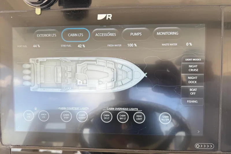  Yacht Photos Pics Touchscreen control panel of a 2017 Boston Whaler 420 Outrage boat, showing fuel and light settings.