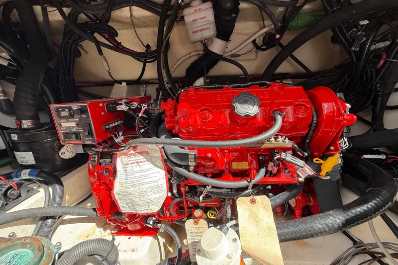  Yacht Photos Pics Engine compartment of a 2017 Boston Whaler 420 Outrage with red machinery and wiring.