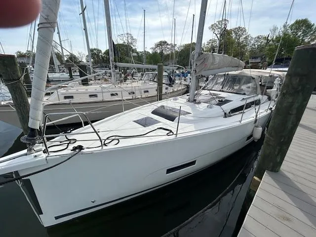 Sirene Yacht Photos Pics 2019 Dufour 390 GL sailboat docked at a marina, featuring sleek design and modern amenities.